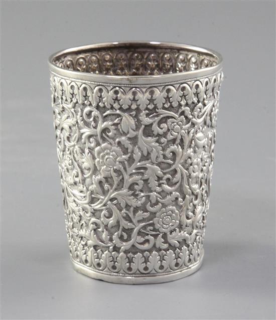A late 19th/early 20th century Indian Colonial silver mug by Oomersee Mawjee & Sons. Bhuj, Kutch, 3.1 oz.
